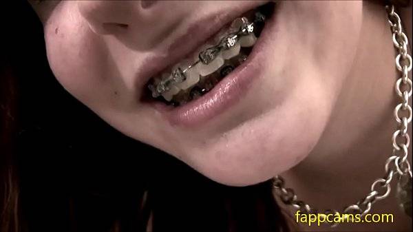 first time for young freckled girl with braces